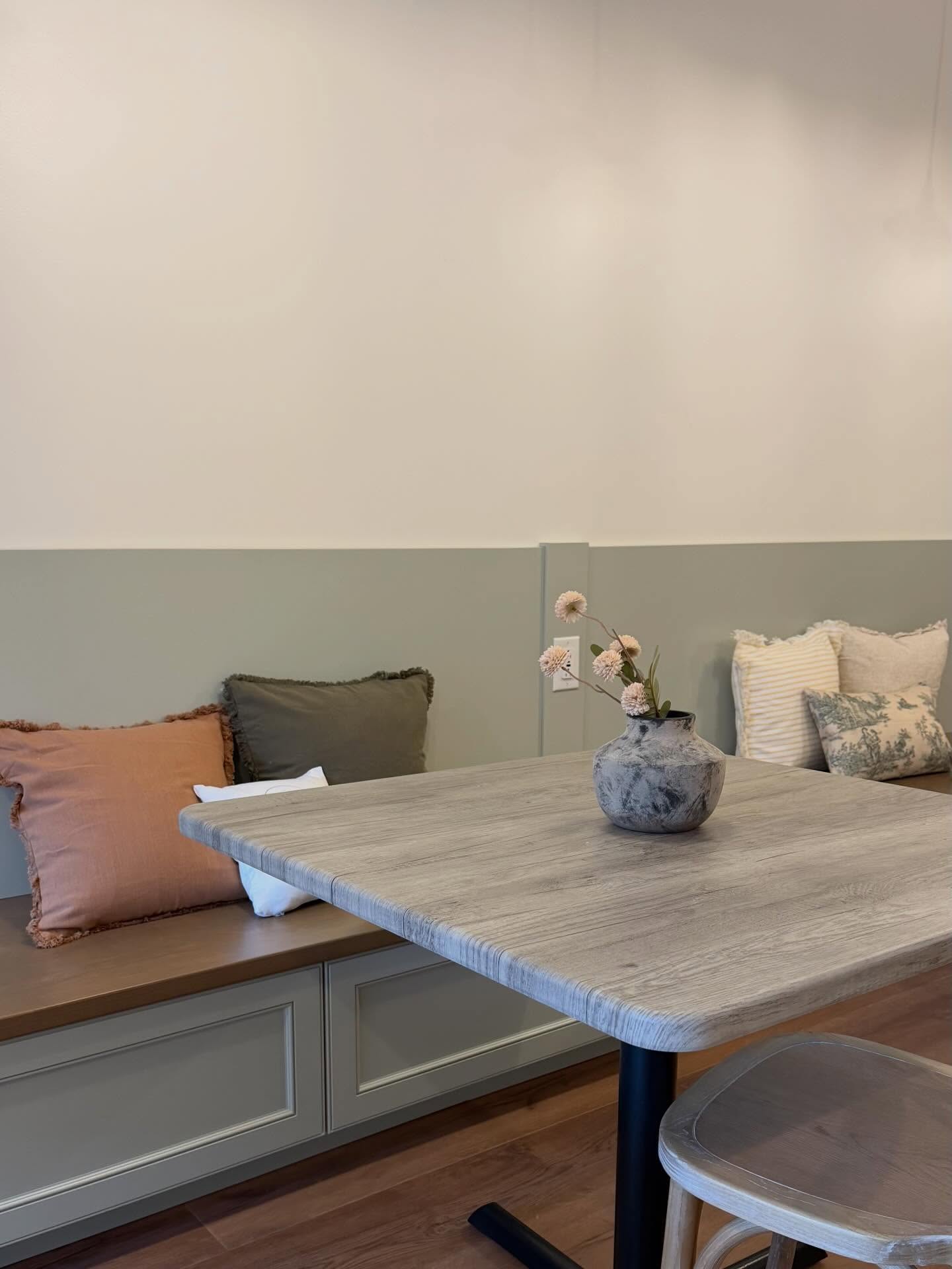 Cozy banquette seating inside Liv and Latte